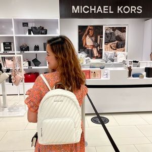 MK MEDIUM ERIN BACKPACK OPTIC WHITE VEAGN FAUX